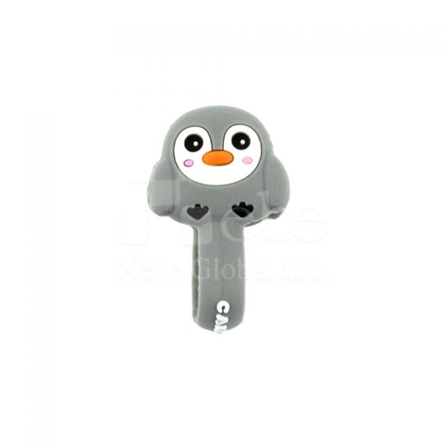 Penguin earphone organizer Soft plastic molding