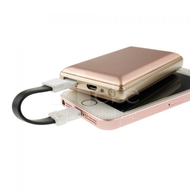 Custom metal surface portable charger