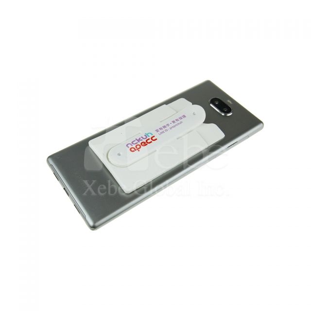 Custom 3-1 card holder pasted on phone