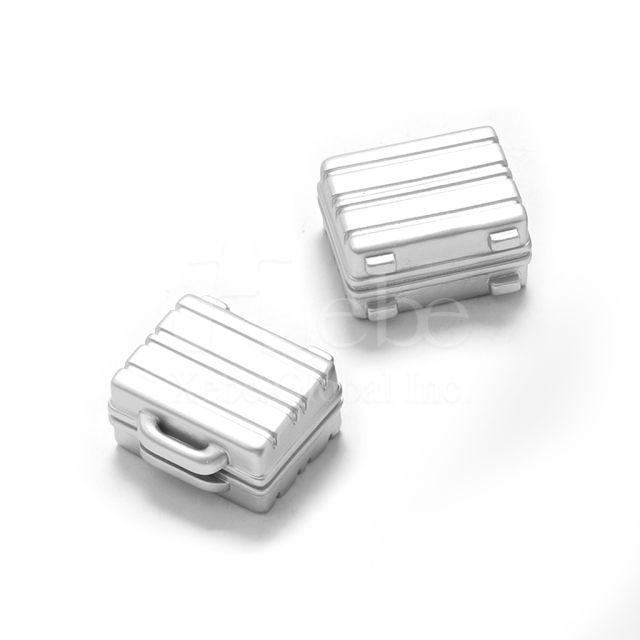 silver suitcase magnet