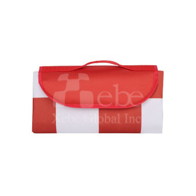 red and white foldable plaid picnic mat