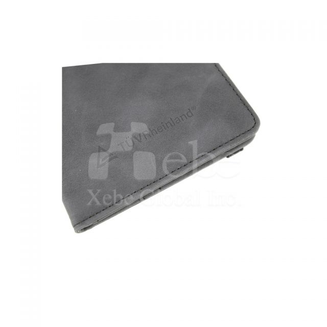 grey textured passport holder