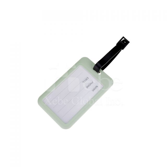 q version of the character luggage tag