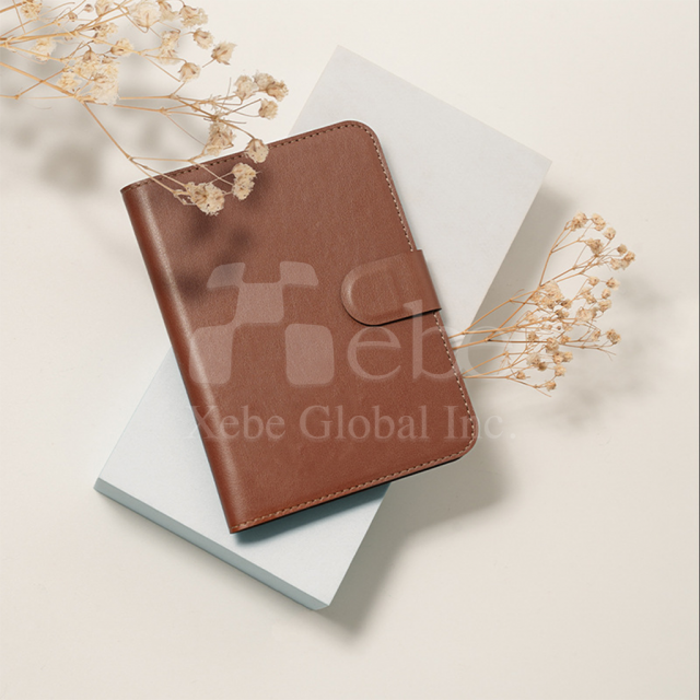 brown leather passport holder