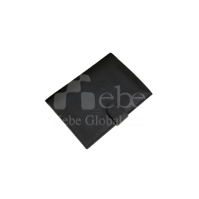 black leather passport holder